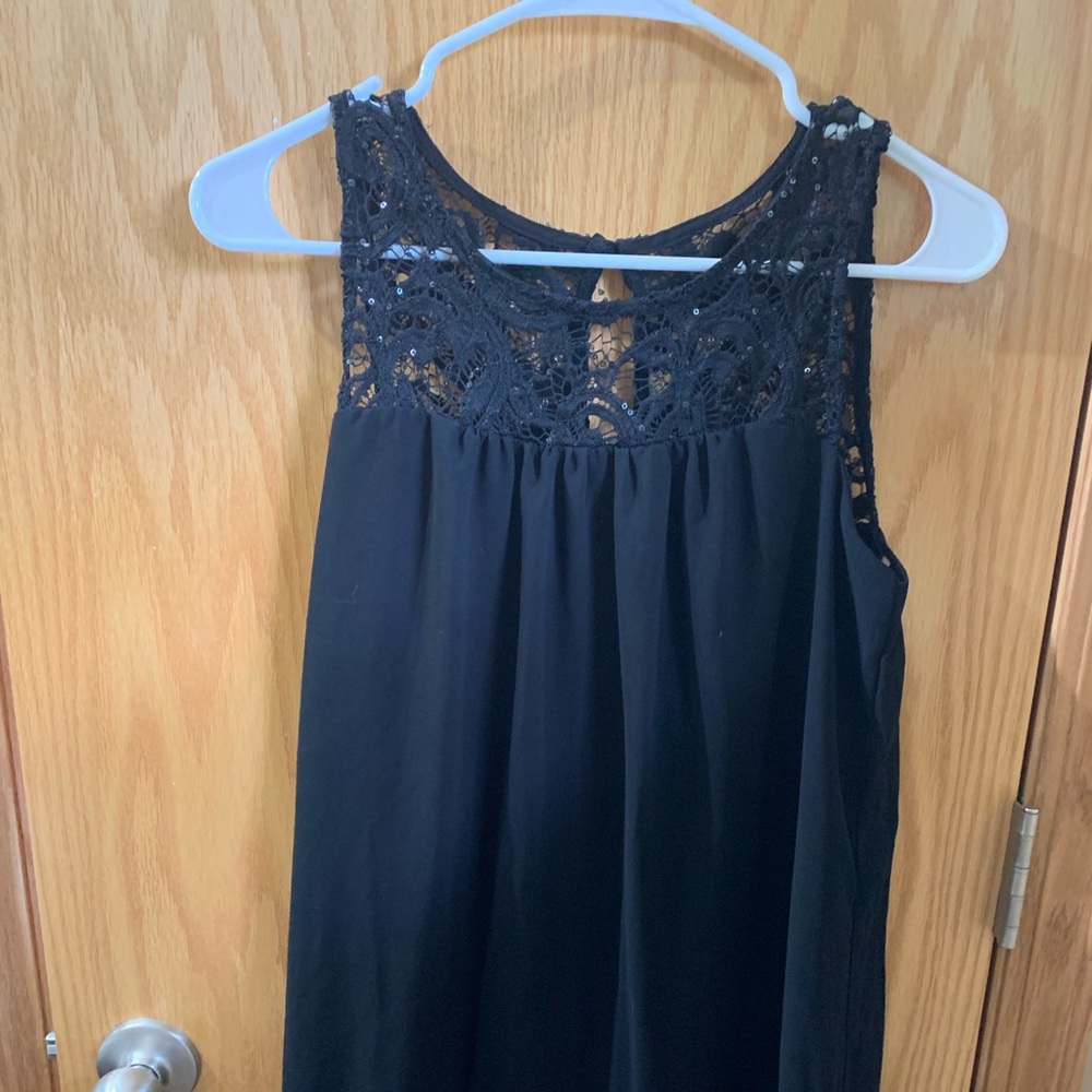 black dress with black sequins on the top